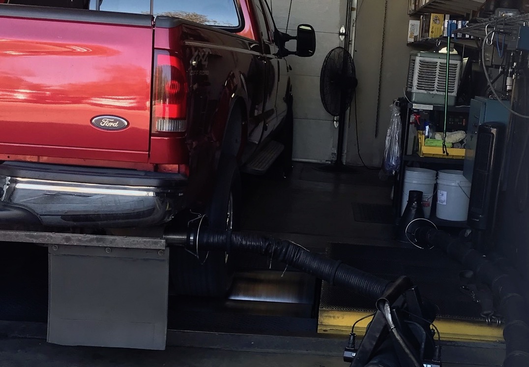 Diesel Emissions Test with red truck Lake Arbor Automotive Westminster