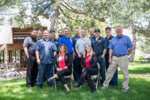 Team photo taken outside Lake Arbor Automotive & Truck Westminster Colorado