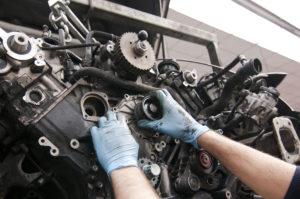 mechanic working on vehicle Lake Arbor Automotive & Truck Westminster Colorado