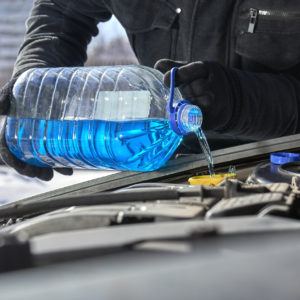 antifreeze being poured into cooling system Lake Arbor Automotive & Truck Westminster Colorado